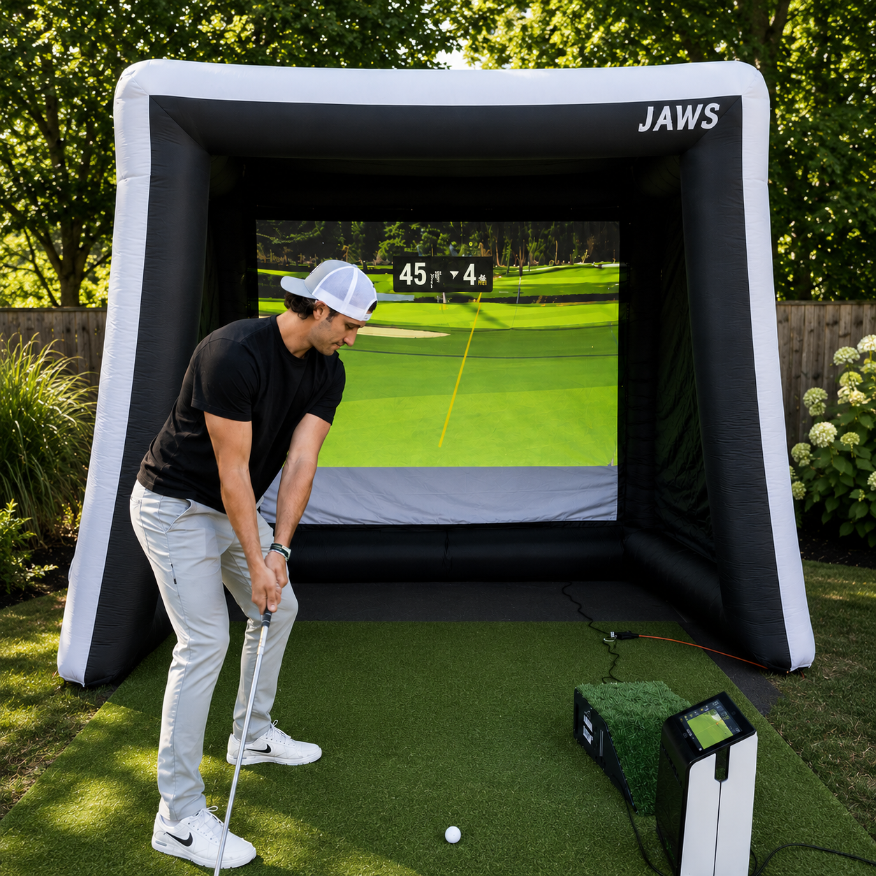 JAWS inflatable golf simulator set up in a Long Island backyard